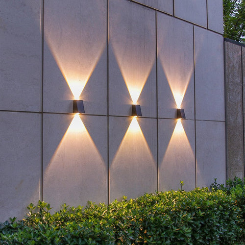 Angled Bi-Directional Solar LED Wall Uplight-Downlight With Integrated Photovoltaic Panel And Prism Lens