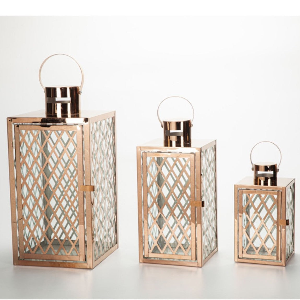 Modern Polished Lattice Metal Lantern Collection with Hinged Door and Top Loop Handle